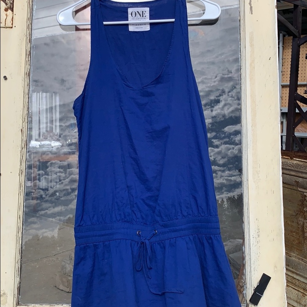 Can be worn as a short dress or a cover up.